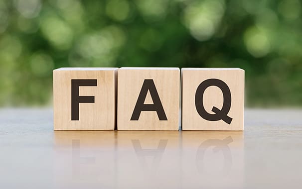 Photo of three scrabble tiles that spell out FAQ